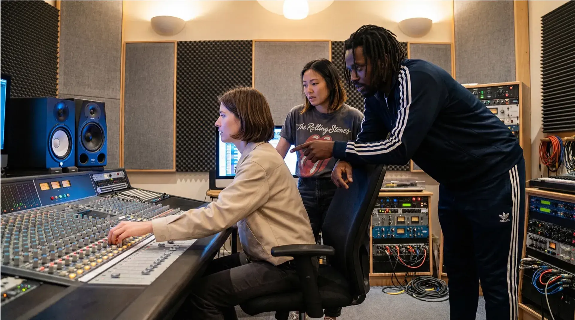 A&R professional reviewing talent in studio