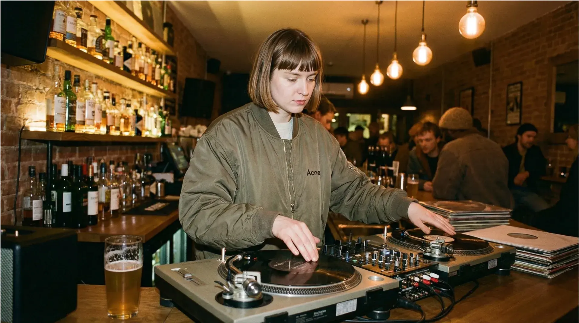 Playlist curator at work curating music in a creative space